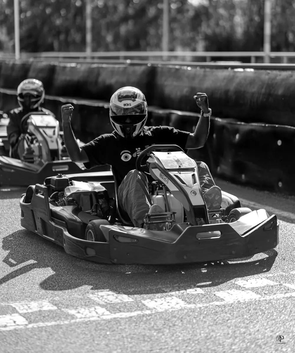 Mbacké celebrating in a kart on track