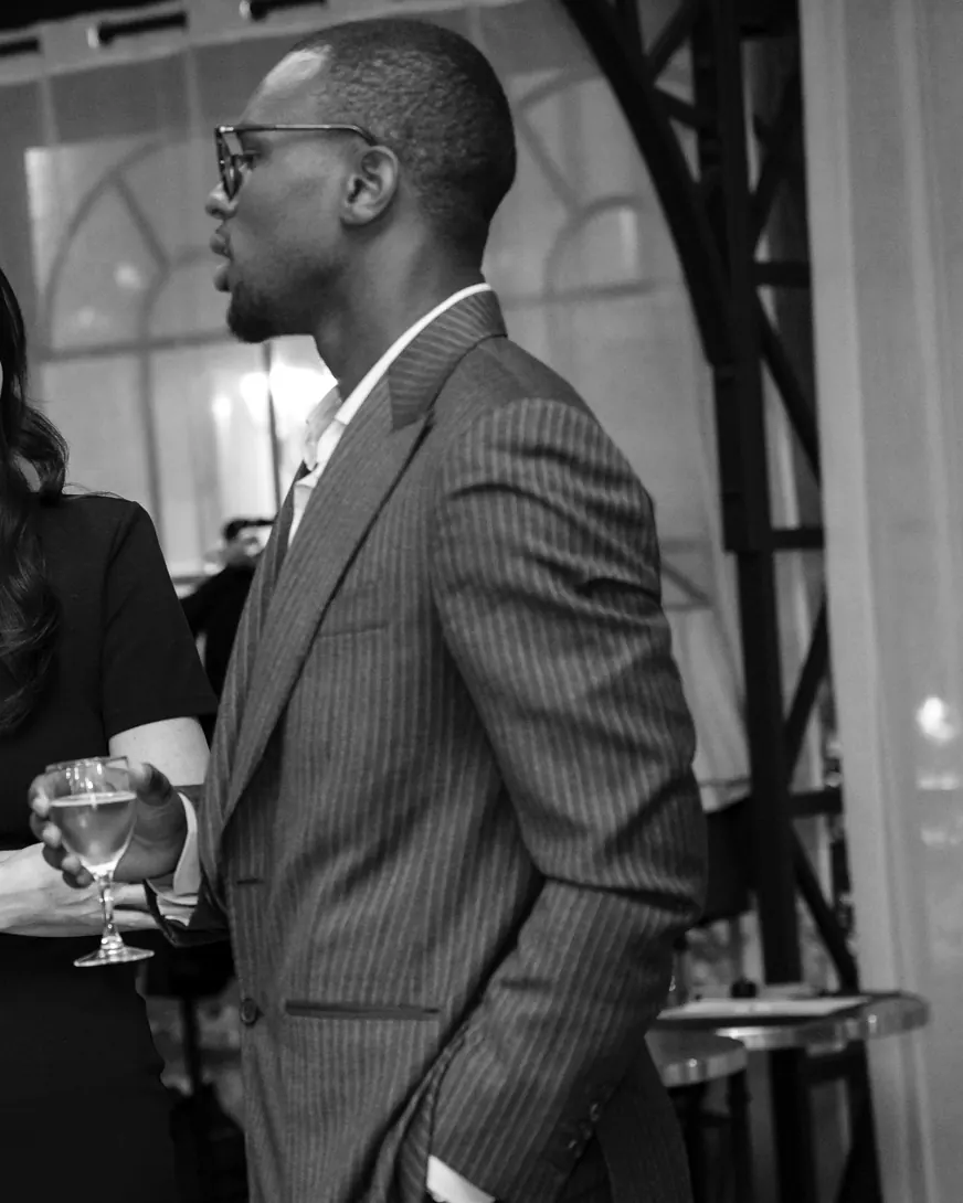 Mbacké in conversation at a networking evening